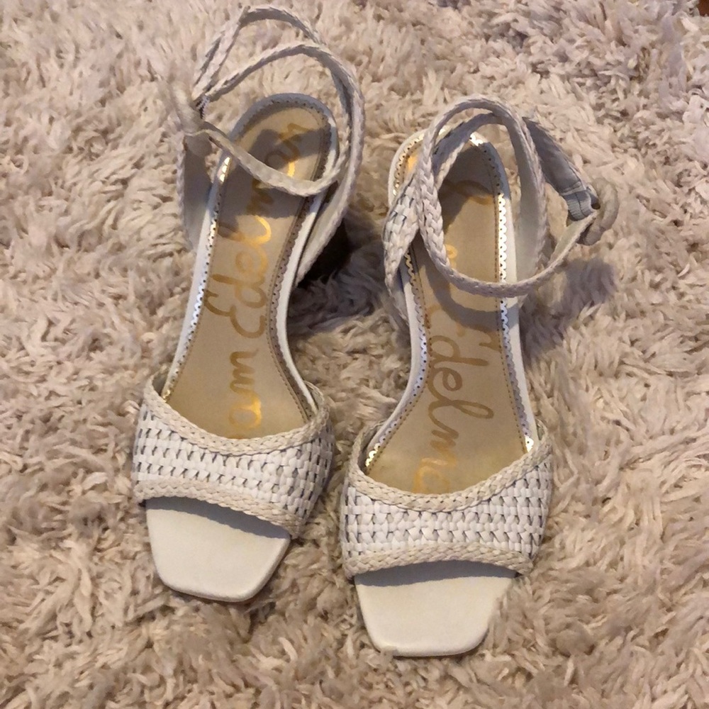 White ankle buckle heels.